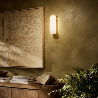 Shown in Burnished Brass finish, Opal Matte shade color, Large size, lit, in use