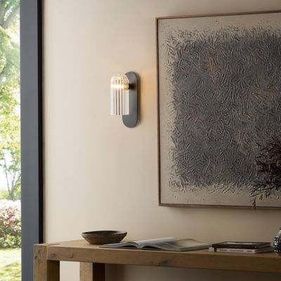 Shown in Black Gunmetal finish, Clear Ribbon shade color, Medium size, in use, lit