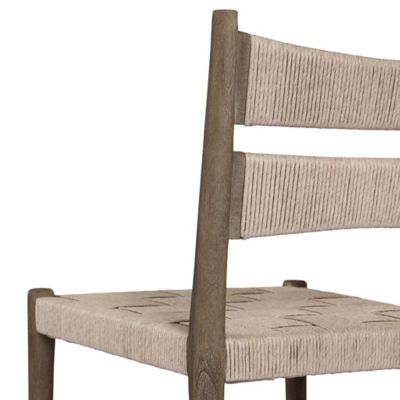Wooden dining chair side profile view.