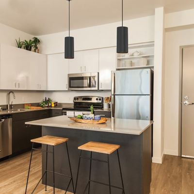 Shown in Matte Black finish, Black Cord Connection option, X-Large - Tall size, in use
