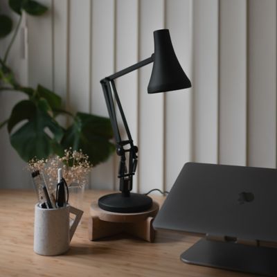 Shown in Carbon Black & Black finish, in use