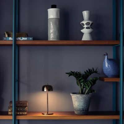 Shown in Rose Gold finish, in use, lit