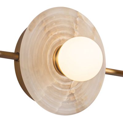 Shown in Vintage Brass with Alabaster finish, 3 light, lit, Detail view