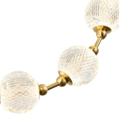 Shown in Natural Brass finish, Standard canopy finish, 8 Light, Detail view, lit