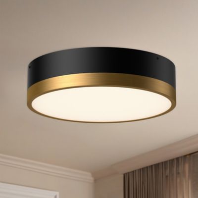 Shown in Aged Gold with Matte Black finish, Large size, lit, in use