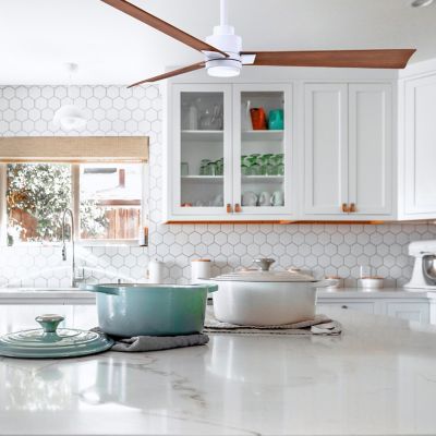 Shown in Walnut Fan Blade finish, Matte White finish, in use