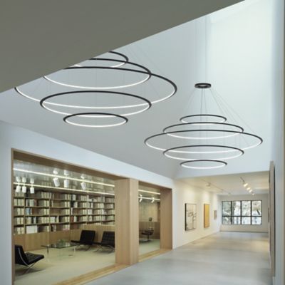 Shown in Black finish, Small size, 2700k Color temperature, Inward Light direction, in use