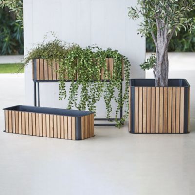 Shown in Teak with lava grey color, in use