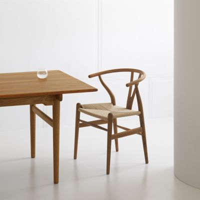 Shown in Oiled Teak Frame finish, Natural Paper Cord Seat color, in use