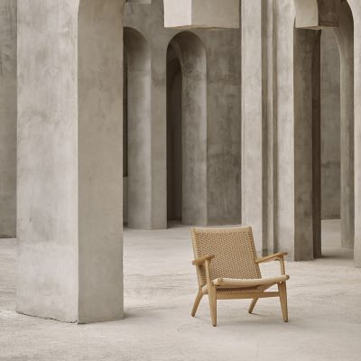 Shown in Oak - Soaped Frame finish, Natural Paper Cord Seat color, in use