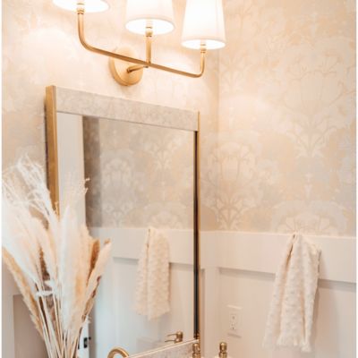 Shown in Aged Brass finish, 3 light, lit