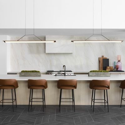 Shown in Brushed Brass finish, Dark Stained Walnut, 64-Inch size, in use