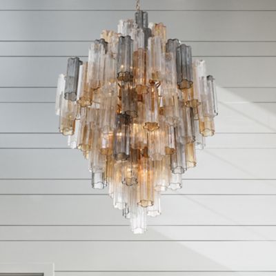 Shown in Aged Brass with Tronchi Glass Autumn finish, in use