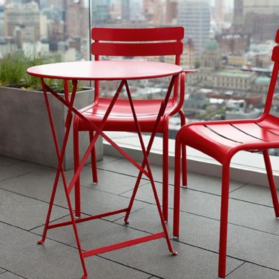 Shown in Poppy Red Flat Satin color, in use
