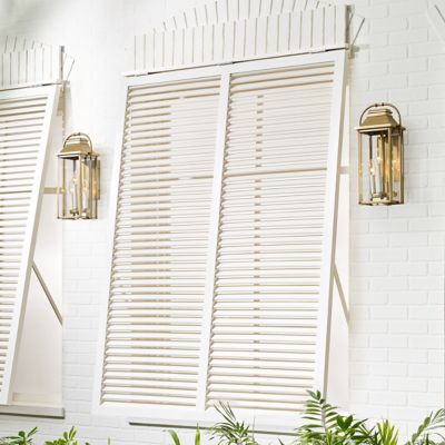 Shown in Painted Distressed Brass with Clear Glass finish, in use