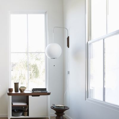 Shown in White with Brushed Nickel Arm finish, in use