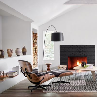 Eames Lounge Chair with Ottoman, Noguchi Rudder Table and Eames Walnut Stools