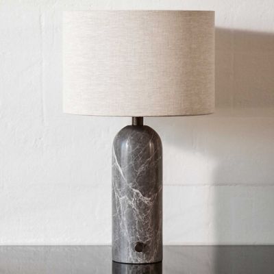 Shown in Grey Marble Base finish, Canvas Shade color, in use