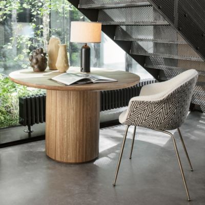 Shown in Blackened Steel Base finish, Canvas Shade color, lit, in use