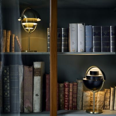 Shown in Black with Brass finish, lit, in use