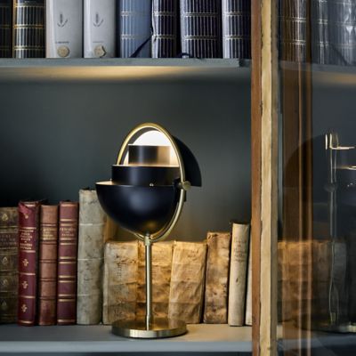 Shown in Black with Brass finish, lit, in use