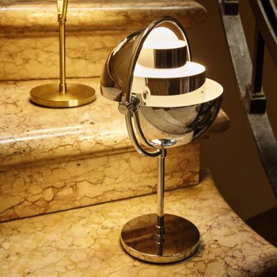 Shown in Brass finish, lit, in use