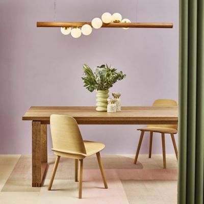 Shown in Brass finish, Walnut Wood finish, in use