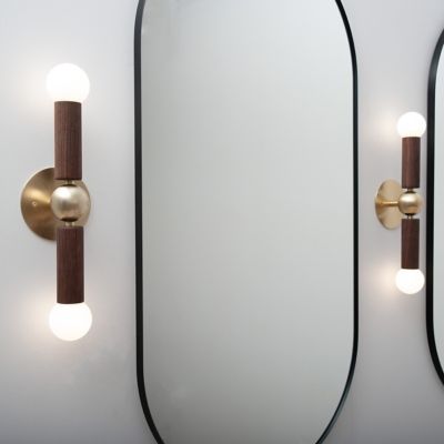 Shown in Brass metal finish, Walnut wood finish, in use