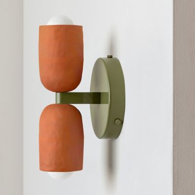 Shown in Terracotta with Terracotta shade color, Reed Green backplate finish, Plug-In type, in use, unlit