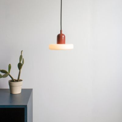 Shown in Oxide Red finish, in use