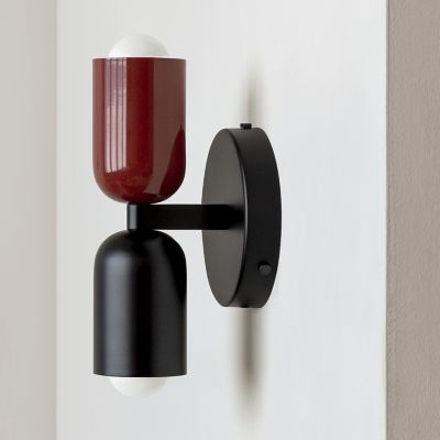 Shown in Oxide Red Up Shade Finish, Black Down Shade Finish, Black Back Plate finish, Hardwire Installation Type, in use, unlit