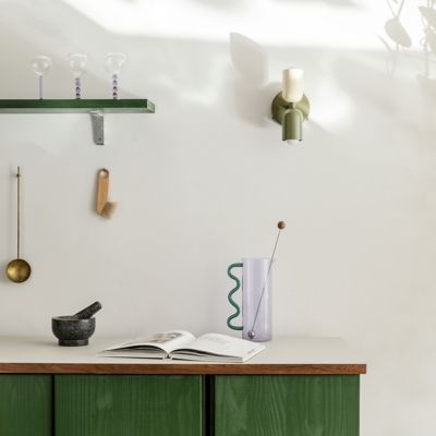 Shown in Bone Up Shade Finish, Reed Green Down Shade Finish, Reed Green Back Plate finish, Hardwire Installation Type, in use, unlit