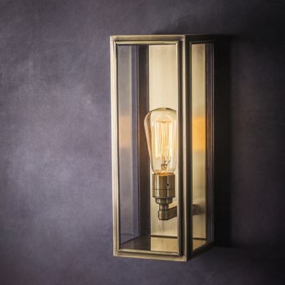 Shown in Antique Brass finish, Clear Glass color, Medium size, in use