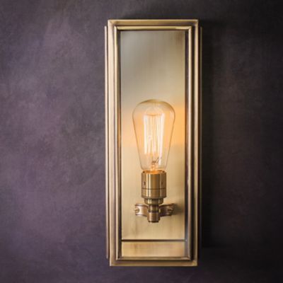 Shown in Antique Brass finish, Clear Glass color, Medium size, in use