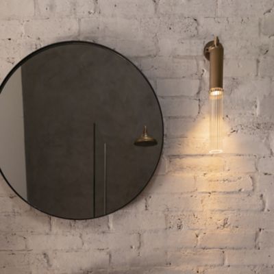 Shown in Antique Brass finish, Reeded Glass color, in use