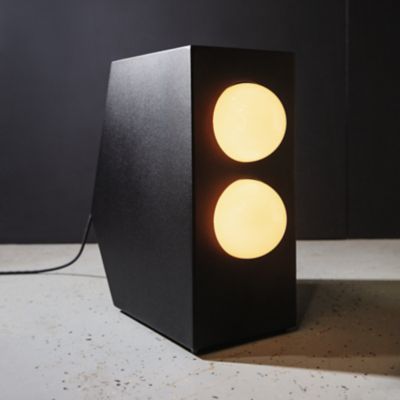 Shown in Black finish, in use, lit