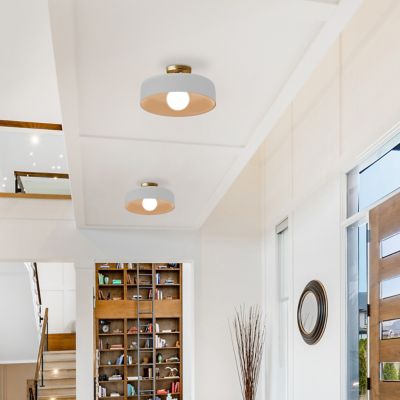 Shown in Matte White finish, Brushed Brass Accent finish, Large size, in use