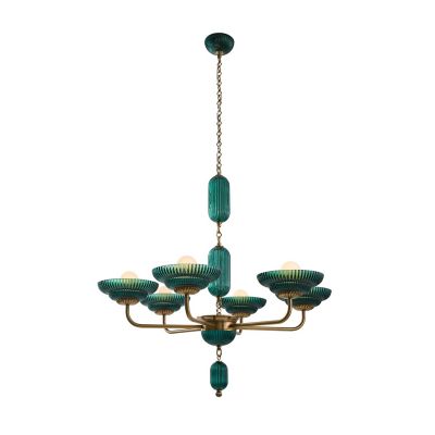 Shown in Satin Brass with Green Glass finish, lit