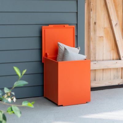 Shown in Sunset Orange color, Small size, in use