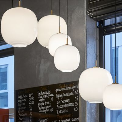 Shown in Brushed Brass finish, Opal shade, in use