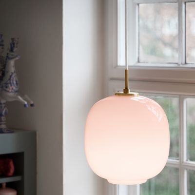 Shown in Brushed Brass finish, Pale Rose shade, in use