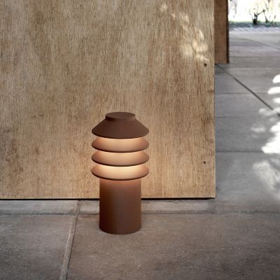 Shown in Corten finish, in use