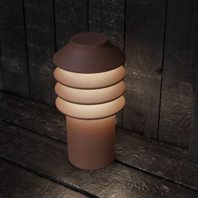 Shown in Corten finish, in use