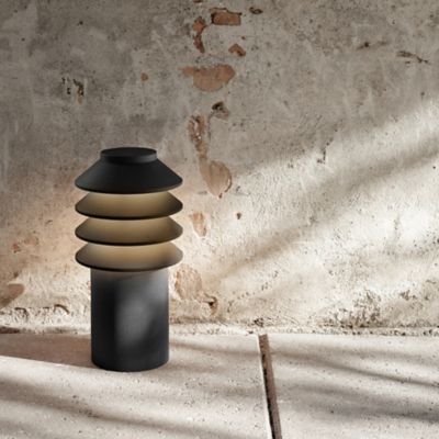 Shown in Black finish, in use, lit