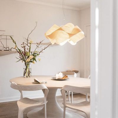 Shown in Ivory White Shade, Matte Black canopy finish, Brushed Nickel finish, in use