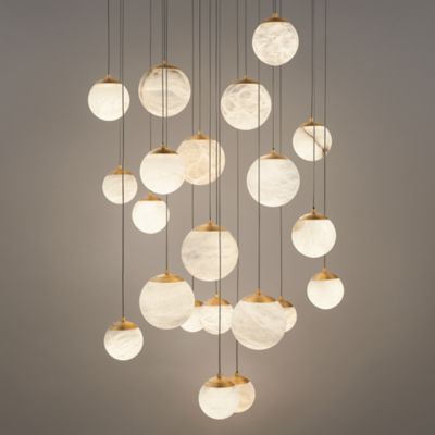 Shown in Aged Brass finish with 21 Light option, in use, lit