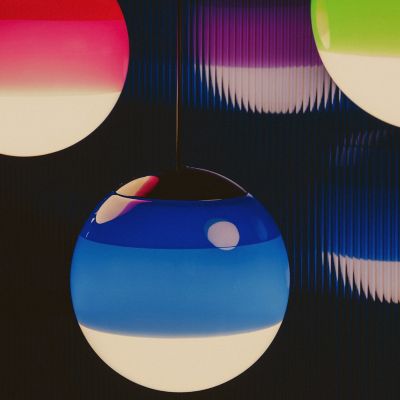 Shown in Amber, Black, Blue, Green, Off-White, Pink finish, lit