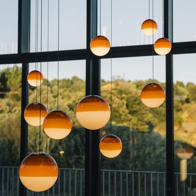 Shown in Amber finish, in use, lit