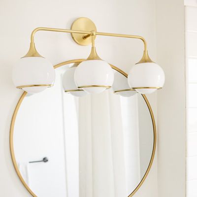 Shown in Aged Brass finish, 3 Light, in use