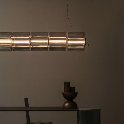 Shown in Carbon finish, Horizontal mount, 11.75 Inch size, 5 Light option, in use, lit
